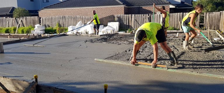 Men constructing a house